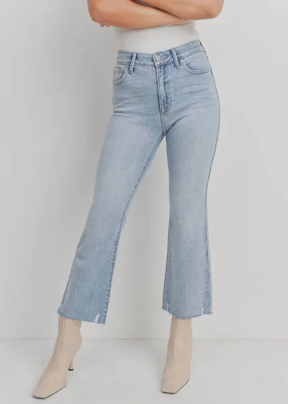 stylish button-up fly jeans for women -High Rise Crop Flare With Distressed Hem Jean In Light Denim